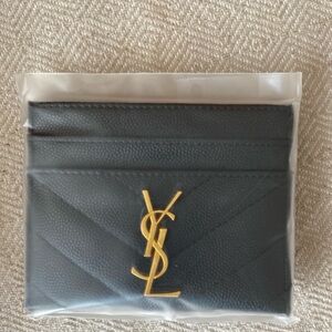 Black wallet with gold logo
